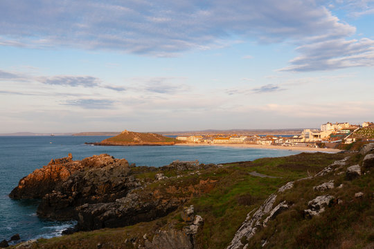 Coastal landscape around Porthmeor Beach at St Ives in Cornwall at sunset