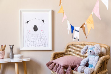 Stylish scandinavian nursery interior with mock up photo frame, teddy bear, design furniture,...