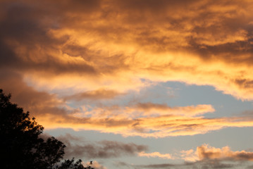 Fototapeta na wymiar Golden Cloud Formations