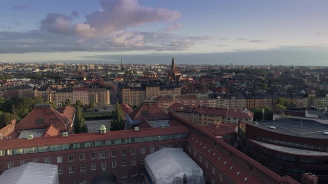 Aerial view of Stockholm city skyline at sunset. Drone shot flying over KTH Royal Institute of Technology in Stockholm, Sweden