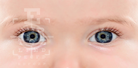 Close up of an Baby eye and vision test - obrazy, fototapety, plakaty