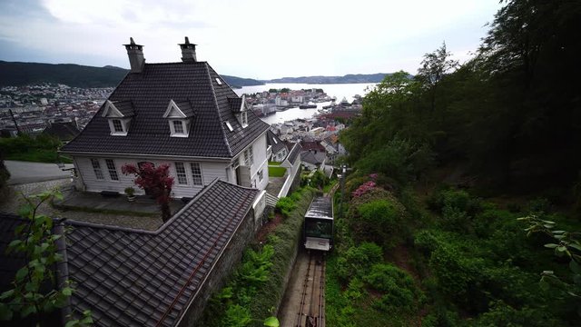 Floyen mountain Floibanen funicular railcar train. Popular landscape for hikes & summer tours. Bergen, Norway city harbor views. Norway in summer, 4k. 