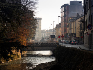 The Lambro river flows through the city of Monza (Italy)