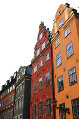 Fototapeta premium Typical Gamla Stan houses in red and orange colors in the autumn in Stockholm Sweden