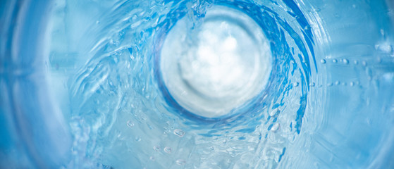 Horizontal background with a swirl of blue clear water