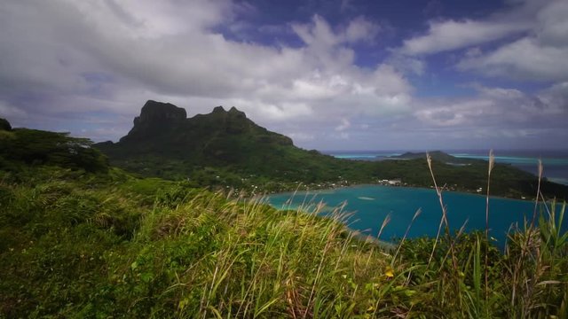 Panoramic view from mountain Otemanu, turquoise blue lagoon in Bora Bora, Tahiti French Polynesia. Luxury travel vacation & romantic getaway, honeymoon exotic destination