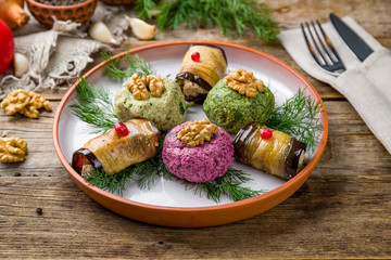 assorted pkhali Georgian cuisine on wooden table