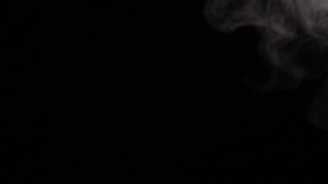 Motion of white steam smoke overlay effect on solid black background with abstract blur swirl wave motion for pollution, wildfire, vapor cigarette, gas, dry ice, warm hot food, boilling noodle soup