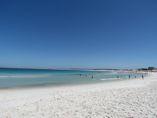 Obraz premium Partial view of Praia Grande in a day of few waves.