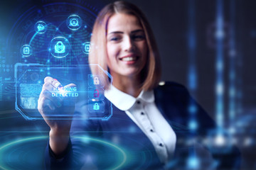 Business, technology, internet and networking concept. Young businessman working  in the office, select the icon Hacking detected on the virtual display.