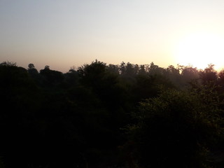 Indian village evening atmosphere sunset . 