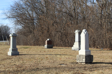 Three obelisks at a tiny suburban Chicago cemetery