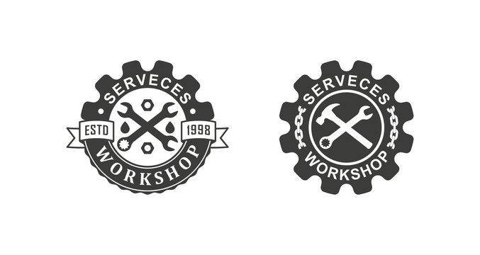 Black and white illustration set of workshop logos on a white background. Vector illustration of a wrench, gear, chain and text with ribbons