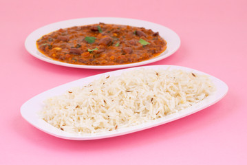 Rajma Chawal or Rajma Jeera Chawal (Rice) is a Traditional North Indian Food, Consisting of Cooked Red Kidney Beans in a Thick Gravy with Spices. Served with Jeera Rice