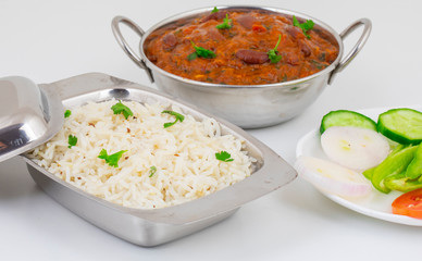 Rajma Chawal or Rajma Jeera Chawal (Rice) is a Traditional North Indian Food, Consisting of Cooked Red Kidney Beans in a Thick Gravy with Spices. Served with Jeera Rice