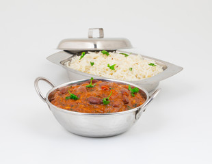 Rajma Chawal or Rajma Jeera Chawal (Rice) is a Traditional North Indian Food, Consisting of Cooked Red Kidney Beans in a Thick Gravy with Spices. Served with Jeera Rice