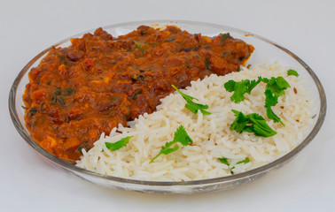 Rajma Chawal or Rajma Jeera Chawal (Rice) is a Traditional North Indian Food, Consisting of Cooked Red Kidney Beans in a Thick Gravy with Spices. Served with Jeera Rice