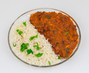 Rajma Chawal or Rajma Jeera Chawal (Rice) is a Traditional North Indian Food, Consisting of Cooked Red Kidney Beans in a Thick Gravy with Spices. Served with Jeera Rice
