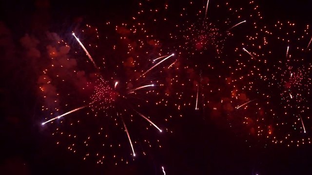Beautiful abstract colourful Fireworks explode display on sky at night a symbol of celebration in New years anniversary for background