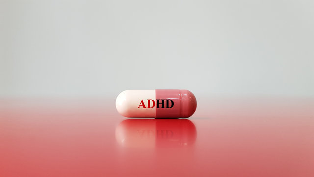 Medication capsule for treatment ADHD(Attention deficit hyperactivity disorder)on red white background. This is mental disorder of neural development cause behavior problem. Medical technology concept