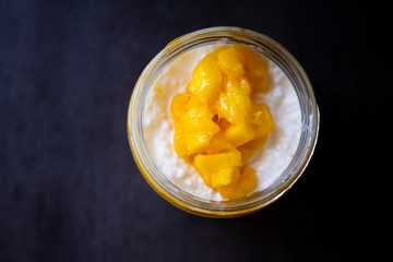 Sweet tapioca pudding with coconut milk and fresh mango