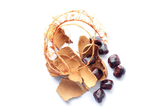 Fiber, Peel and Seeds of Tamarind isolated on white background.