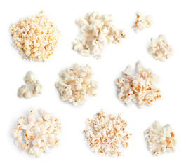 Set of tasty pop corn on white background, top view