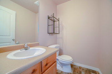 Interior of a bathroom with toilet and sink