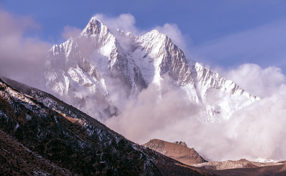 Greatness of nature concept: grandiose view of Lhotse peak (8516 m) at sunset. The third highest peak in the world after Everest and K-2 peaks; Nepal, Himalayas