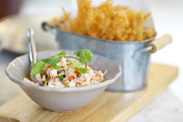 Crispy Water Spinach Spicy Salad with fresh shrimp and minced pork on white bowl