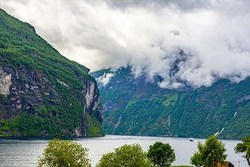 View from Geiranger harbor to Geiranger fjord in summer
