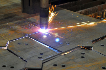 Metal cutting. The process of cutting metal using plasma cutting.