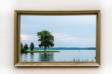 Framed view of Schweriner Innensee lake from Schwerin Castle. Germany
