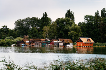 Old wooden cottages on the lake shore in Schwerin, Germany