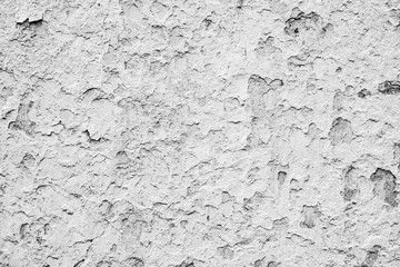 Texture of a concrete wall with cracks and scratches which can be used as a background