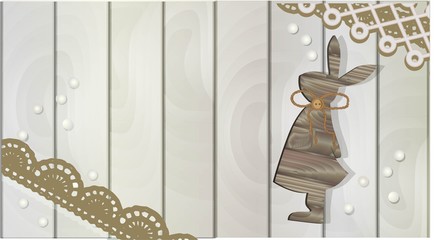 Easter background on a wooden board. Bunny from the tree FIGURINE. grey colour. NATURAL COLORS. The basis for the text. Easter is a holiday of spring. Advertising banner for postcards or promotions..