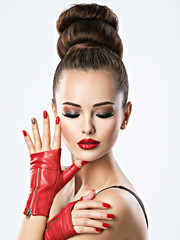 Beautiful sensual woman with red nails