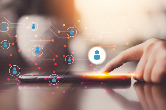 Woman hand using smart phone at coffee shop with people icon and line dot abstract background. Technology business and connect communication concept.