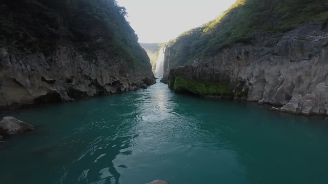 River and amazing crystalline blue water of Tamul waterfall in San Luis Potos&iacute;, Mexico