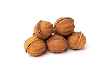 Shortbread in shape nut with caramel isolated on white background.