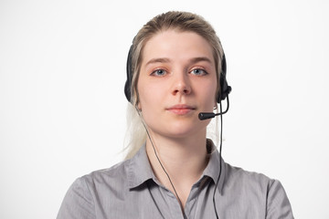 Portrait of attractive business woman with headset isolated over white background with large area for your text.