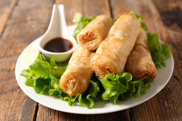 fried spring roll with soy sauce and lettuce