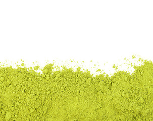 Green Green matcha powder on white background from above. Matcha made from finely ground green tea...