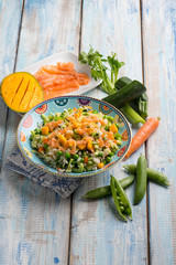 rice salad with smoked salmon mango and mixed vegetables
