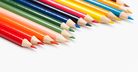Multi color pencils. the concept of a multinational family and equality in the world.