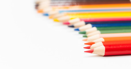 Multi color pencils. the concept of a multinational family and equality in the world.