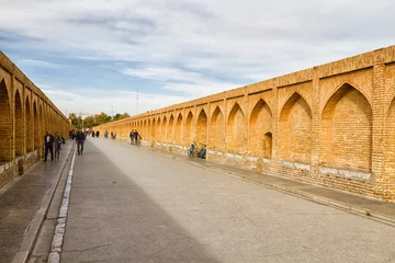 Wall murals Khaju Bridge ISFAHAN, IRAN - NOVEMBER 20, 2016: Allahverdi Khan Bridge (Si-o-seh pol), ancient bridge in Iran, Middle East, Asia. The bridge has 23 arches, is 133 meters long, 12 meters wide.