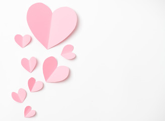 Shape of heart flying on white paper background.
