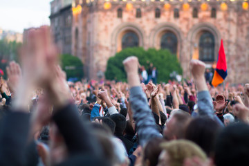 A raised fist of a protest