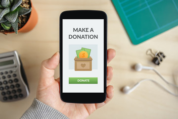 Make a donation concept on smartphone screen